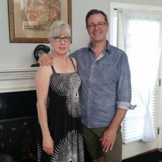 A happy couple enjoying a moment together at home.