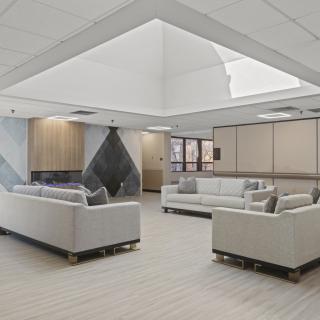 Spacious and modern lobby with comfortable sofas and a contemporary design.