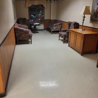 A tranquil waiting area featuring comfortable seating and warm lighting.