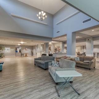 A modern and spacious interior lobby with comfortable seating and elegant lighting.