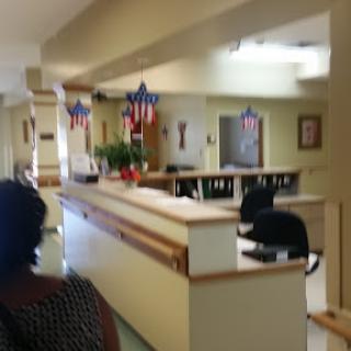 A welcoming reception area with patriotic decorations.