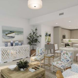 A bright and modern living room featuring stylish furniture and decorative elements.