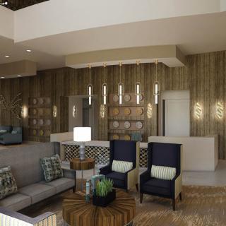 Modern lobby with stylish seating and elegant lighting.