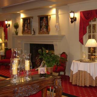 An elegant restaurant interior with classic decor and warm lighting.