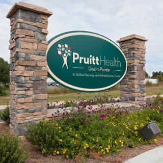 Pruitt Health facility sign, showcasing their commitment to healthcare services.
