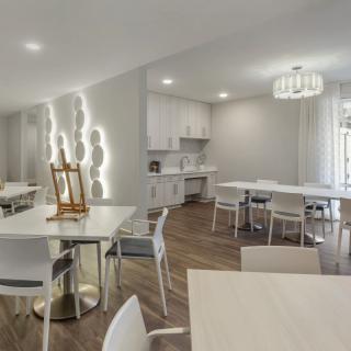 A modern dining area with minimalist furniture and clean design.