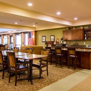 A cozy dining and bar area with comfortable seating.