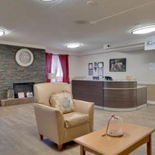 A cozy and modern reception area with comfortable seating and stylish decor.