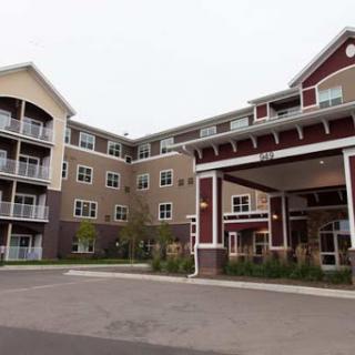 A modern apartment complex showcasing contemporary architectural design.