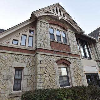 A beautifully designed vintage building showcasing intricate stone and brickwork.