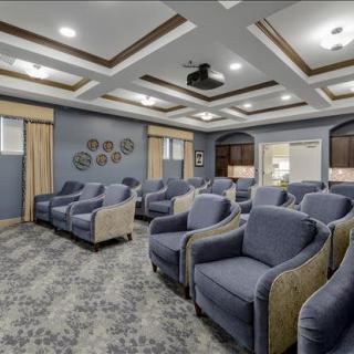 A modern, spacious room with comfortable seating and stylish design.