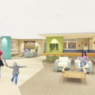 A modern lobby with comfortable seating and people interacting in a bright, inviting space.