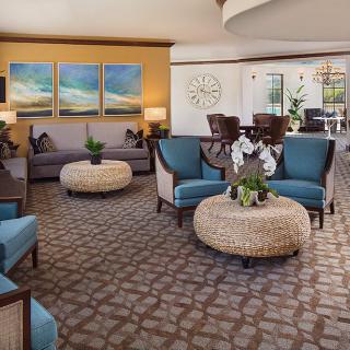 A modern hotel lobby with stylish seating and decor.