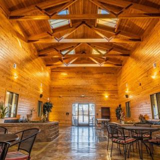 A cozy dining area with wooden interiors and rustic charm.