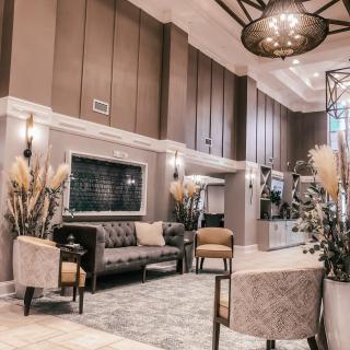 A luxurious hotel lobby with elegant seating and modern design elements.