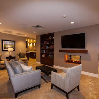A stylish and modern living room featuring comfortable seating and a cozy ambiance.