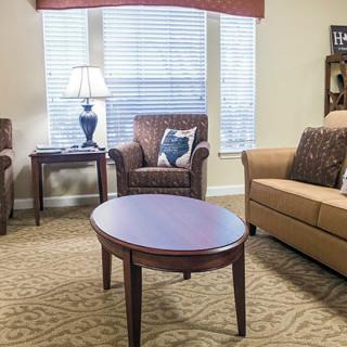 A cozy living room with comfortable seating and a coffee table.
