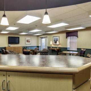 A modern lobby area with comfortable seating and ample lighting.