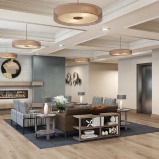A modern lobby with comfortable seating and elegant lighting.
