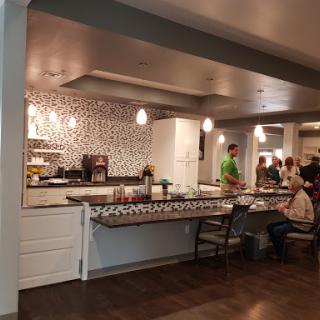 A modern kitchen and dining area with stylish decor and a welcoming atmosphere.