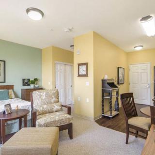 A cozy and modern living room with comfortable seating and bright decor.