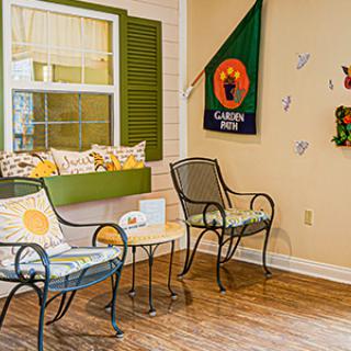A cozy waiting area with colorful decor and comfortable seating.