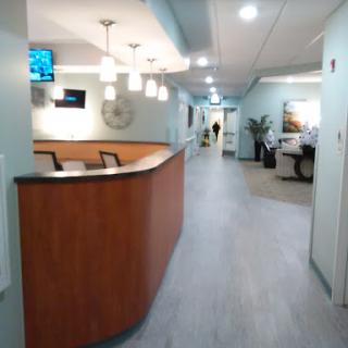 A spacious and modern hospital reception area with a clean, inviting atmosphere.