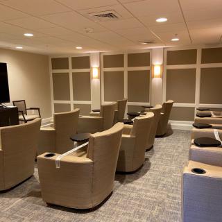 A comfortable lounge area with arranged seating and soft lighting.