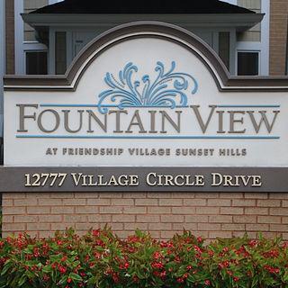 Entrance sign for Fountain View at Friendship Village, located at 12777 Village Circle Drive.