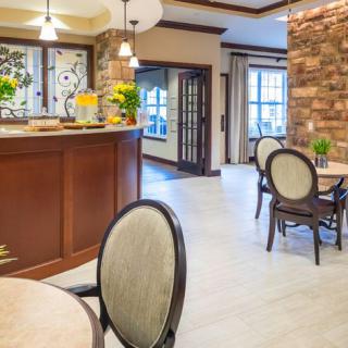 A cozy lobby with comfortable seating and a reception desk.