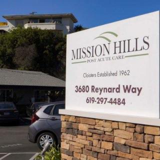 Sign for Mission Hills Real Estate located at 3460 Reynard Way.