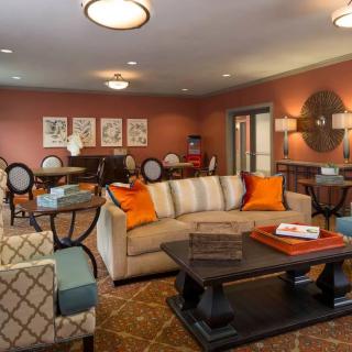 A cozy living room with stylish furniture and warm decor.