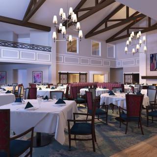 Elegant restaurant interior with neatly arranged tables and chandeliers.