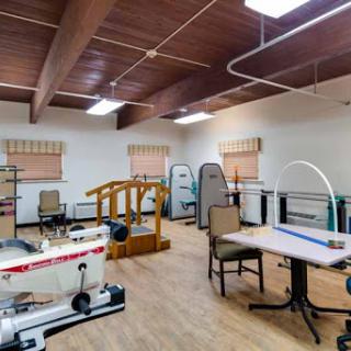 A well-equipped physical therapy room designed for rehabilitation and patient care.