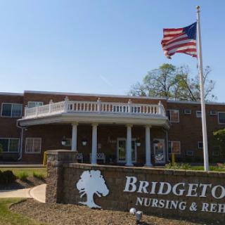 Bridgeton Nursing & Rehabilitation Center with the American flag flying in front.
