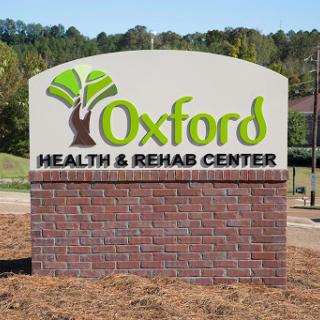 Sign for the Oxford Health & Rehab Center, showcasing its commitment to health and rehabilitation services.