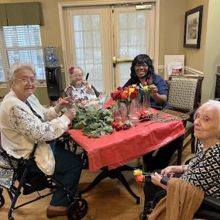 A joyful moment shared among residents during a communal activity.