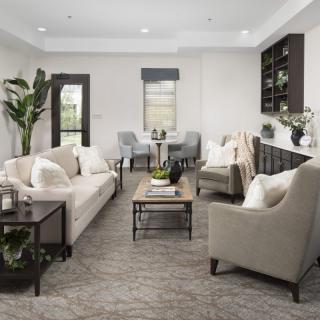 A modern living room with elegant furnishings and decor.