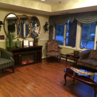 A cozy living room with elegant furniture and a warm ambiance.
