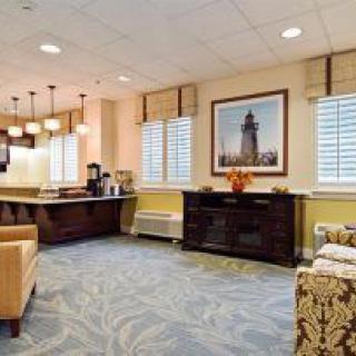 A cozy lobby with comfortable seating and elegant decor.