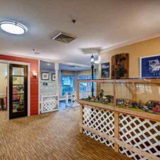 A welcoming restaurant entrance with colorful decor and dining area.
