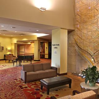 A welcoming hotel lobby featuring comfortable seating and stylish decor.
