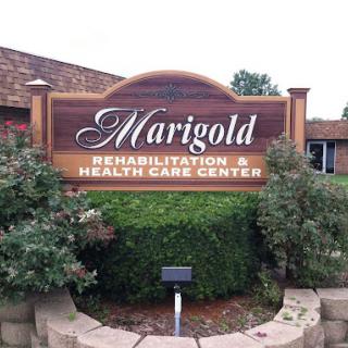 Entrance sign for Marigold Rehabilitation & Health Care Center.