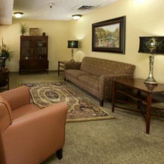 A cozy living room with comfortable seating and tasteful decor.