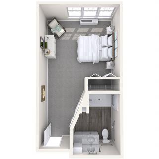 A minimalist floor plan of a small bedroom with an attached bathroom, featuring a bed, desk, and seating area.