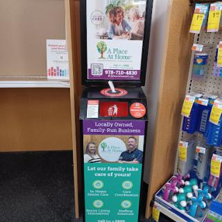 A display stand promoting family and community health services through donations.