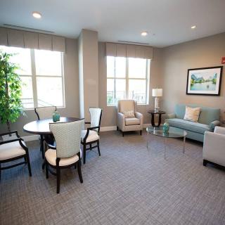 A cozy living room with comfortable seating and natural light.