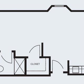 A floor plan illustrating the layout with a closet and staircase.