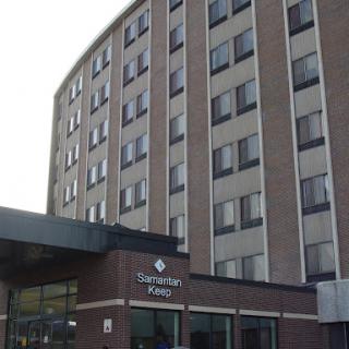 A view of a modern hotel building from the exterior.