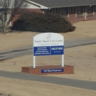 A sign indicating a healthcare center, providing information about services offered.